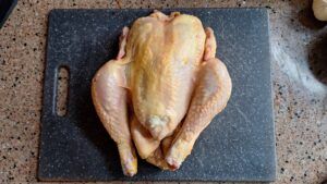 hele kip vullen met boter